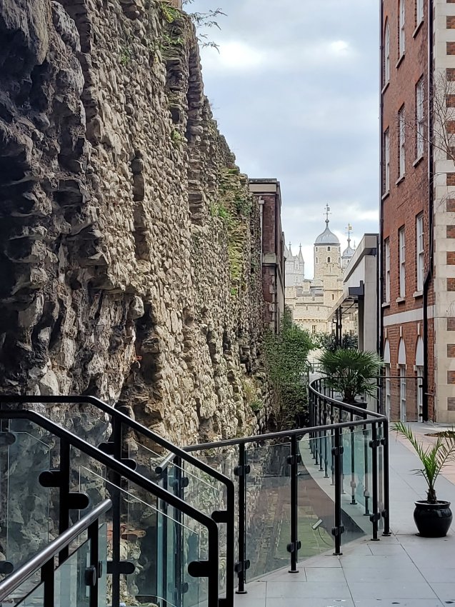 Cooper's Row Roman Wall with Tower of London beyond, City of London