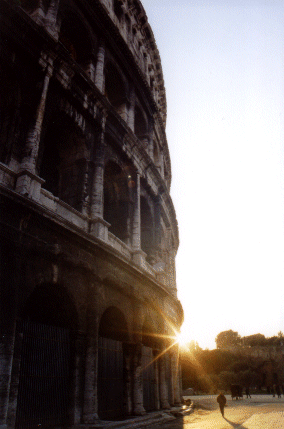 The Colloseum plus low sun, Rome, Italy