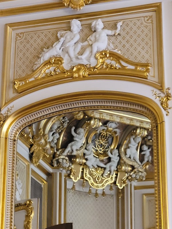 Some of the 80 Cherubs in the Gold Room, Harlaxton Manor, Lincolnshire